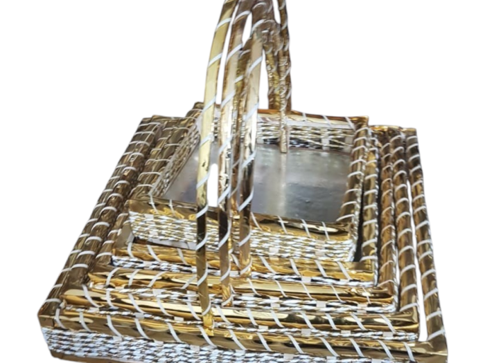 Decorative woven wedding gift baskets with gold handle detailing, ideal for jahez presentation, bridal gift hampers and Pakistani wedding setups.