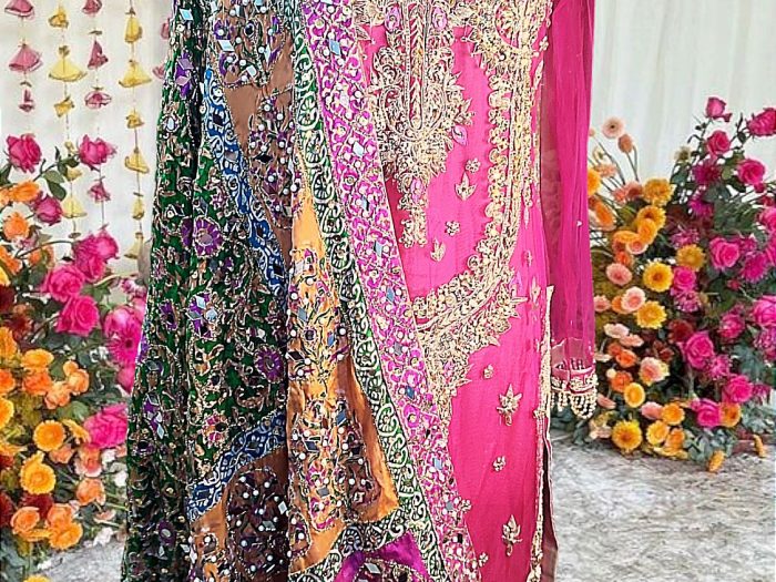 Fuchsia Fame – A vibrant pink wedding couture ensemble, meticulously hand-embellished. Featuring a stunning shirt, a pure atlas jamawar sharara, and a heavily adorned Indian silk dupatta with intricate mirror work. Made on order for timeless elegance.